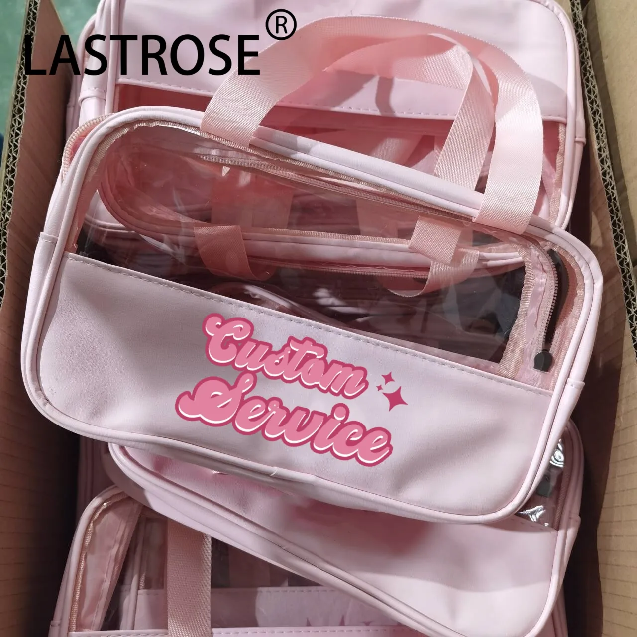 Bolsa de maquiagem em pvc portátil transparente rosa, bolsa de plástico para armazenamento de cosméticos PU de marca própria, bolsa de mão transparente para uso no atacado