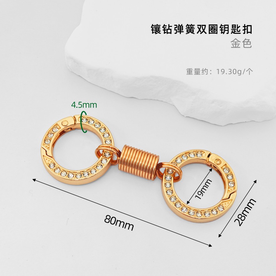 Diamond-encrusted spring ring - gold