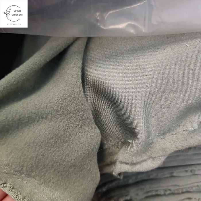 Nuovo arrivo all'ingrosso maglia dty spazzola tessuto poliestere latte di seta pigiama tessuto stock lotto per indumento