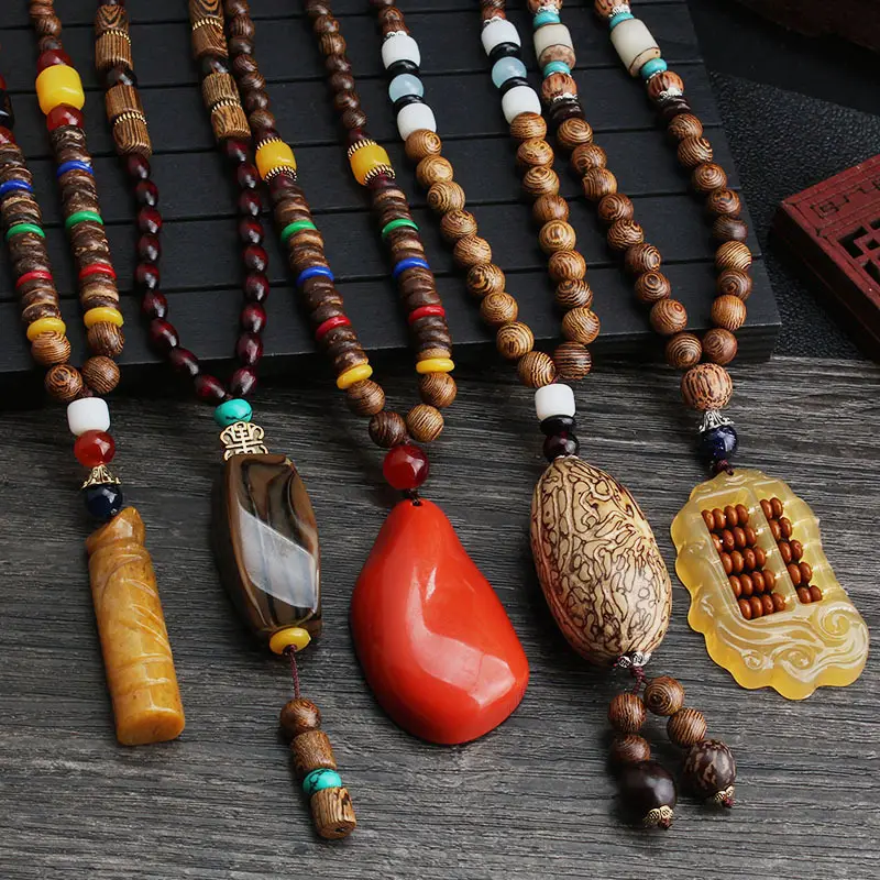 Venta al por mayor Boho joyería Vintage Nepal collar religión Tribal cuentas de madera joyería hecha a mano colgantes largos collar de cuentas