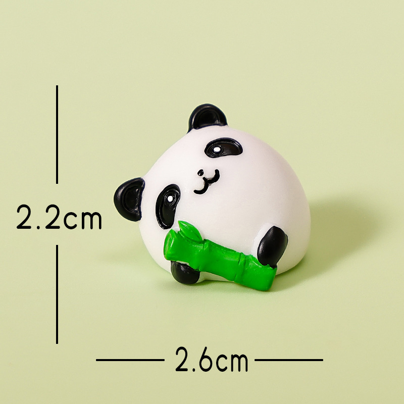 Panda che abbraccia il bambù