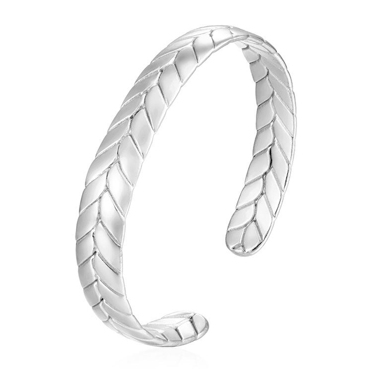 The wide-faced wheat ear bracelet is in steel color