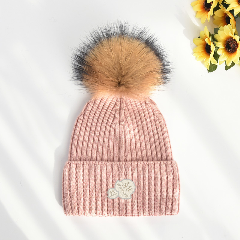 Pink with brown pom