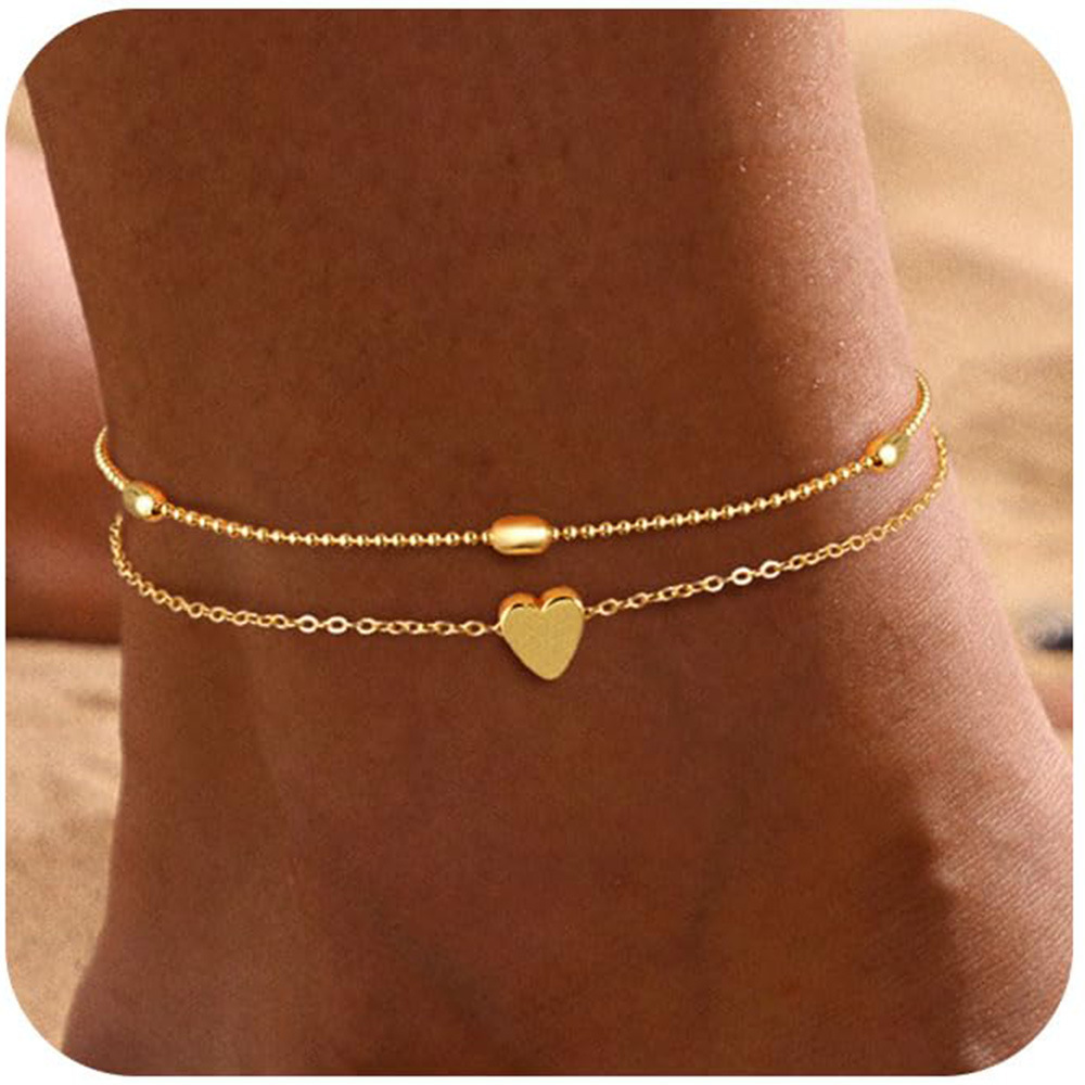 Grandes perles ovales dorées double couche + forme coeur