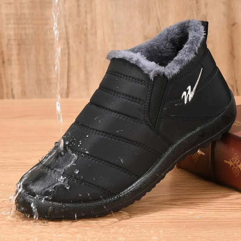 Botas para hombre y mujer planas e impermeables con forro polar, zapatos de invierno informales para la nieve, cálidos, para uso diario, novedad de 2022