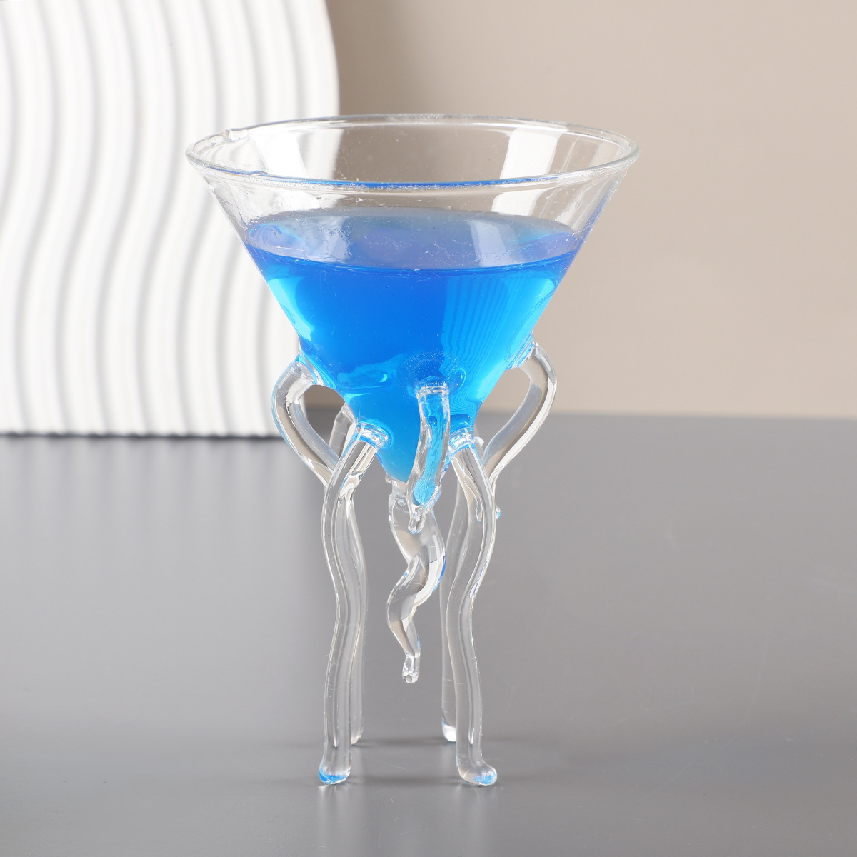 Octopus-shaped cup with triangular base