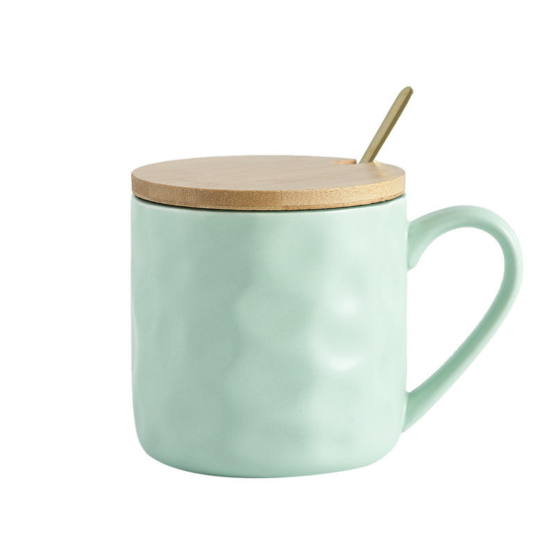 Tasse bicolore à motif pierre verte avec couvercle et cuillère