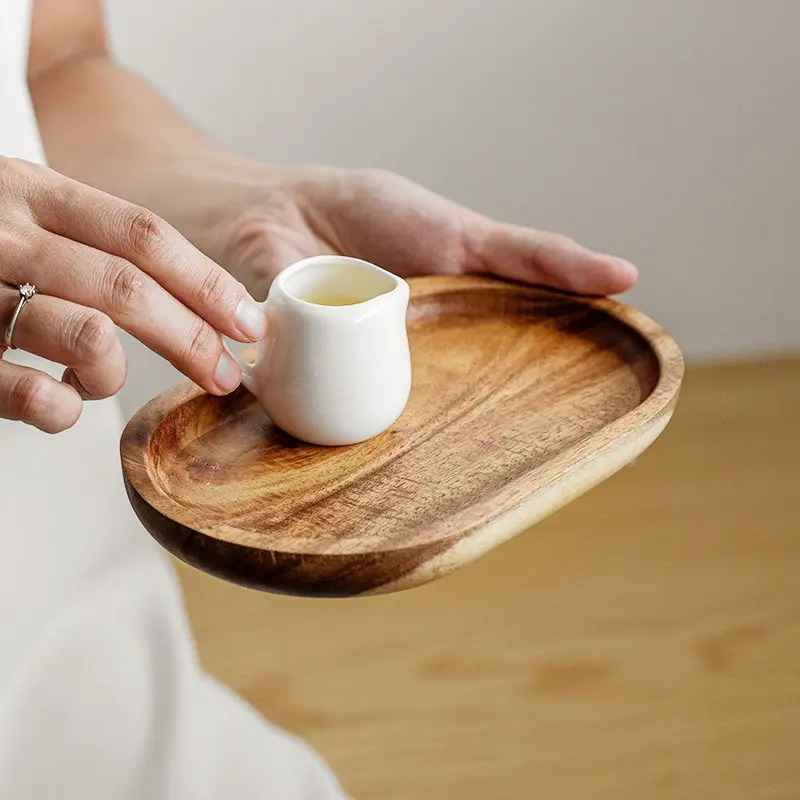 Vendita calda forma ovale piatto decorativo vassoio da portata in legno di Acacia per caffè tè frutta cibo Dessert vassoio in legno