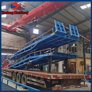 Plataforma de descarga certificada CE Máquina niveladora de muelle tipo escalera Plataforma de carga y descarga de contenedores