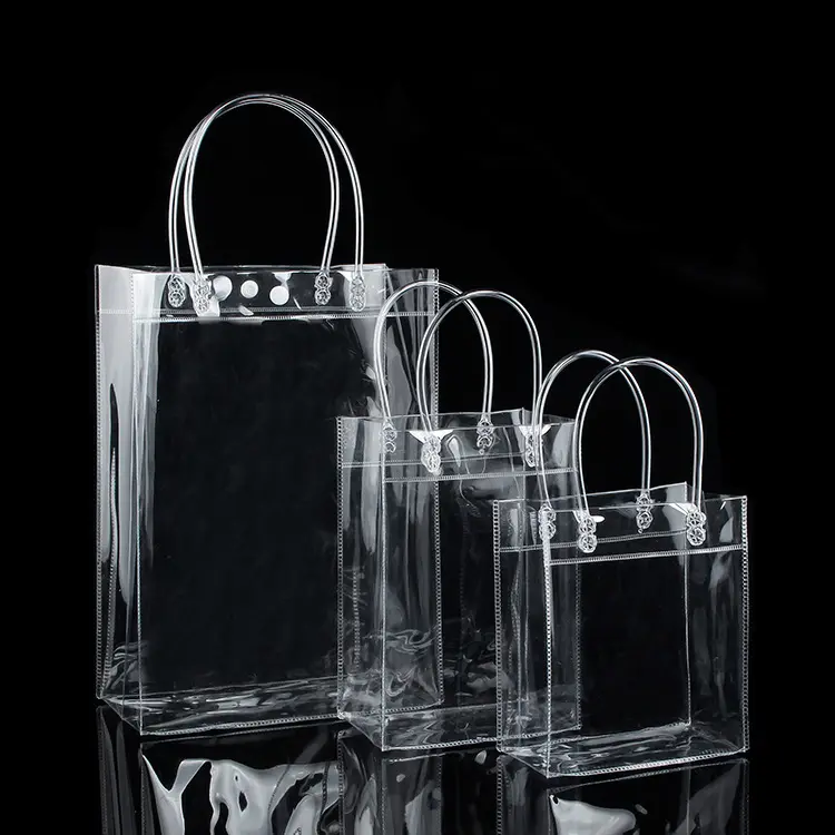 Bolso de compras con estampado de holograma personalizado transparente impermeable para mujer de alta calidad, bolso de PVC con asas de PU para tienda de relojes