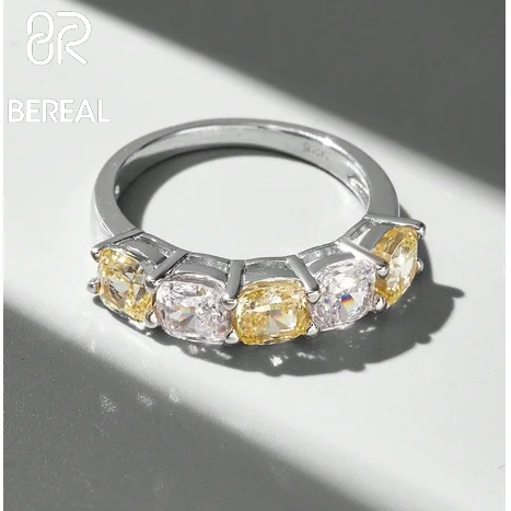 round side-stone ring