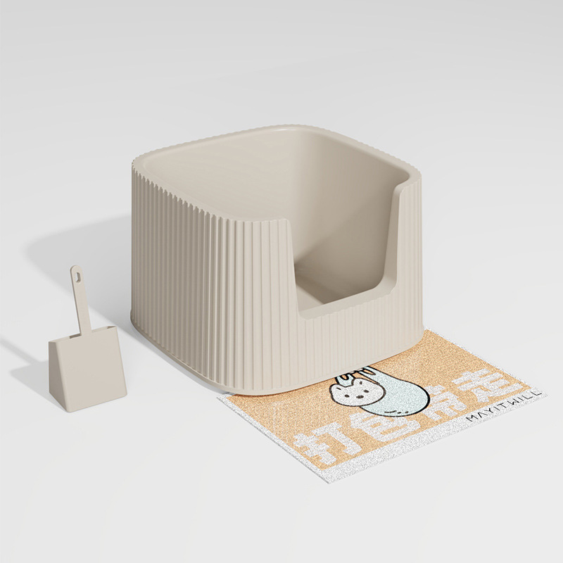 Pala para arena de gato color té con leche y alfombrilla de control de arena.