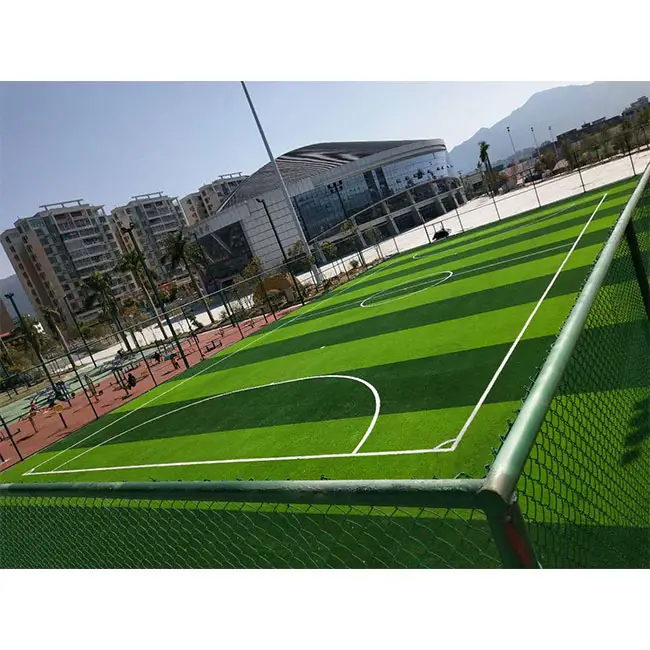 Césped sintético de césped artificial aprobado por AVG FIFA para campos de fútbol Mini cancha de fútbol azulejos entrelazados al aire libre