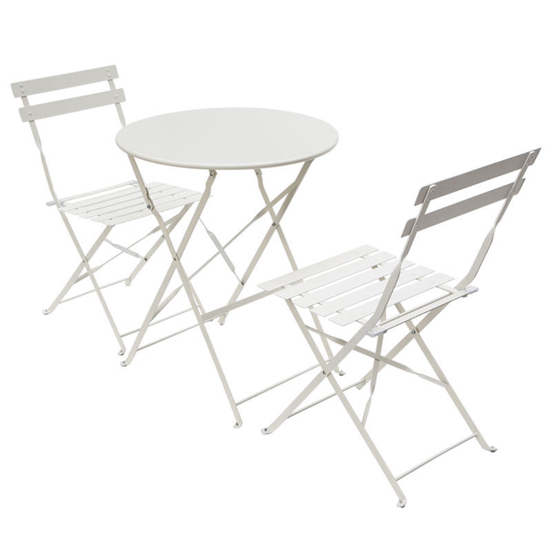 Ensemble comprenant 2 chaises en fer forgé blanc et 1 table ronde pliante.