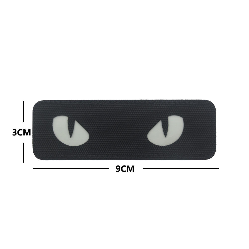 M00009-2 œil de chat réfléchissant (lumineux noir et blanc)