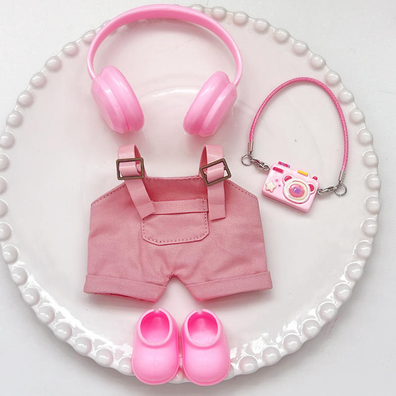 Auriculares rosas + mono rosa + cámara rosa + zapatos rosas