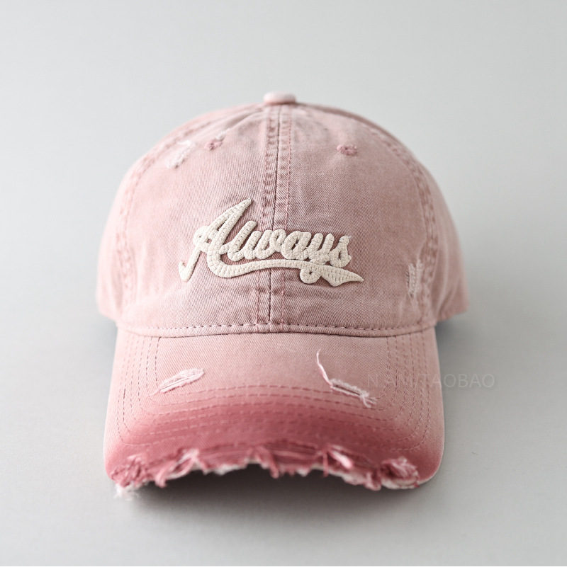 Gorra de béisbol rosa con degradado en el ala.