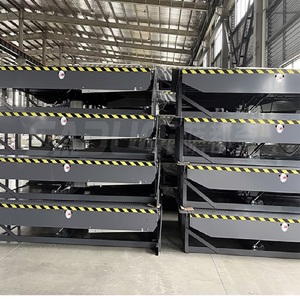 Herramientas de carga y descarga de almacén Suministro del fabricante Niveladores de muelle hidráulicos fijos para una logística de almacén rápida
