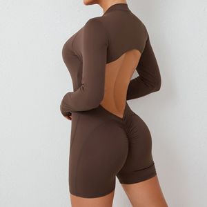 女性ビューティーバックハーフジップヨガボディスーツレディ長袖ラウンドネックランニングジャンプスーツ女性スクランチバットミドリフジムトラックスーツ