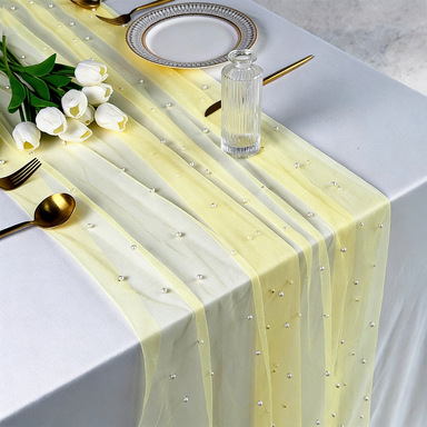 Yellow gauze and white beads