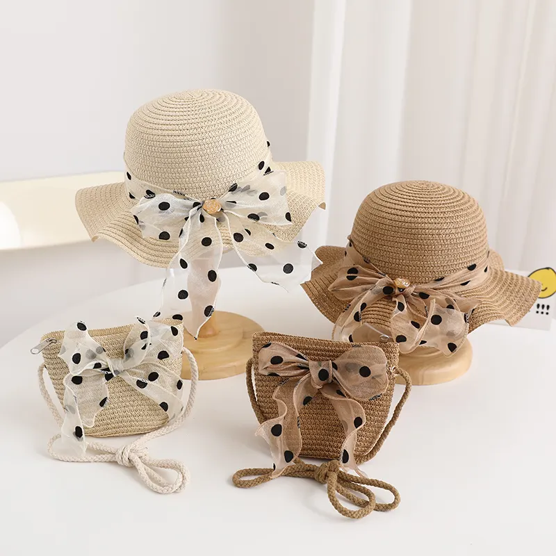 Trẻ em mùa hè bagset sang trọng ribbon rộng sóng vành Bowknot phát hiện ngọt ngào dễ thương dù để che nắng hat cho bãi biển Ngoài trời cô gái túi rơm hat Set