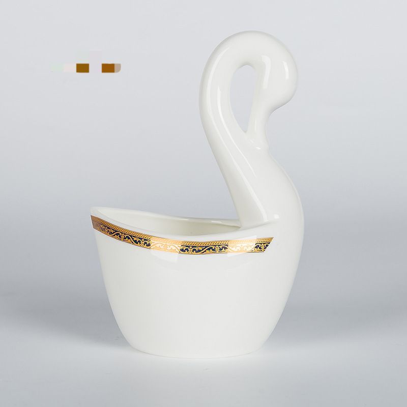 Cisne con borde de oro blanco