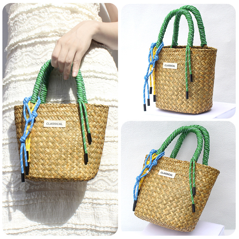 Yellow bag with green hand rope