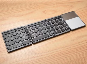 Recién llegado, teclado Universal táctil de tres sistemas con Bluetooth, piezas plegables, banda para sombrero, teclado para tableta, tijera, transfronterizo