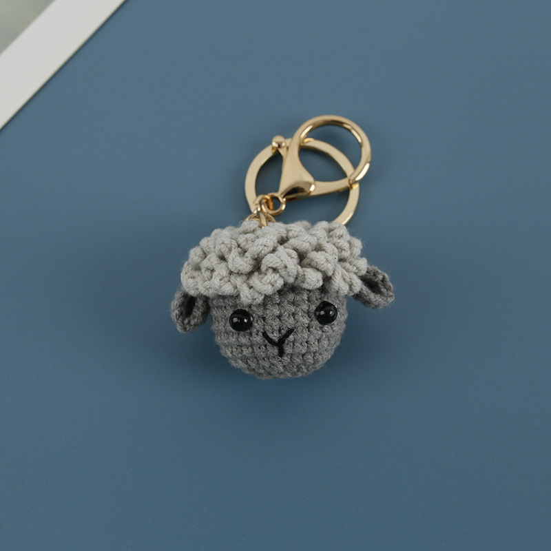 Gray sheep head pendant