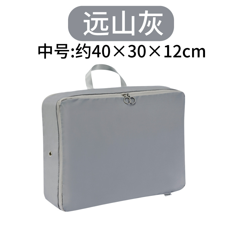 One medium-sized down jacket storage bag in Far Mountain Grey