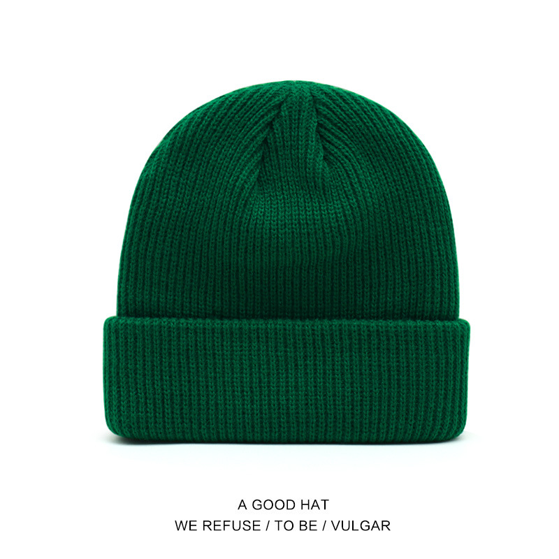 Bonnet en laine vert foncé