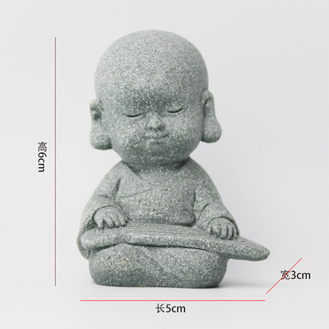 Little novice monk playing piano