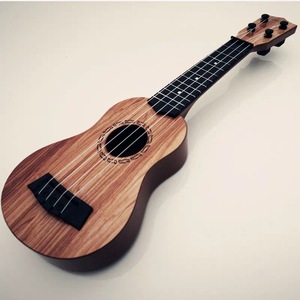 <span class=keywords><strong>Multi</strong></span> Colors Simulation Ukulele Kinder simulation Gitarre kann Aufklärung Puzzle Instrument Musikspiel zeug spielen