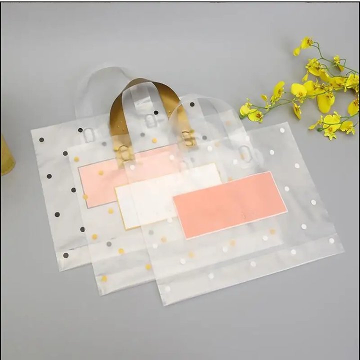 Sacchetti di plastica di grandi dimensioni spessi con manico sacchetti regalo a punti rotondi bianchi trasparenti sacchetti di imballaggio per la spesa di negozi di gioielli di abbigliamento