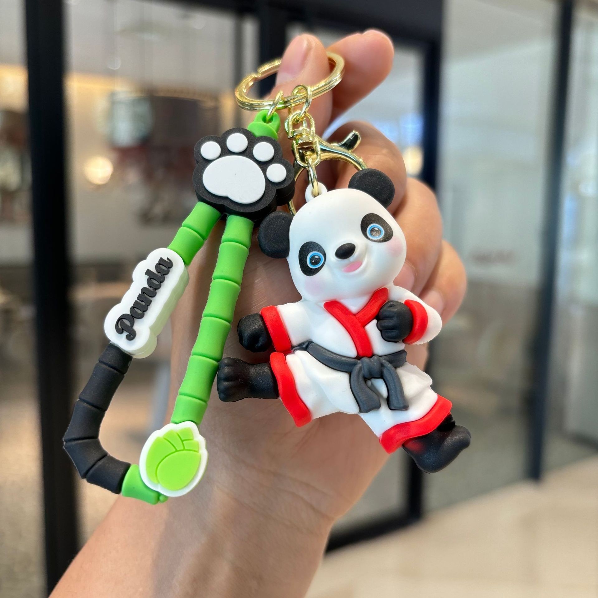 Panda keychain-kicking