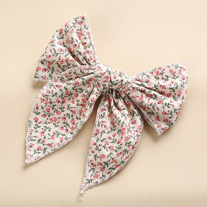 Nœud pour cheveux marin en tissu fleuri avec pince crocodile
