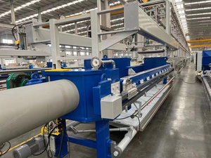 Filtropressa per fanghi a membrana controllata da programma automatico con sistema di lavaggio in tessuto