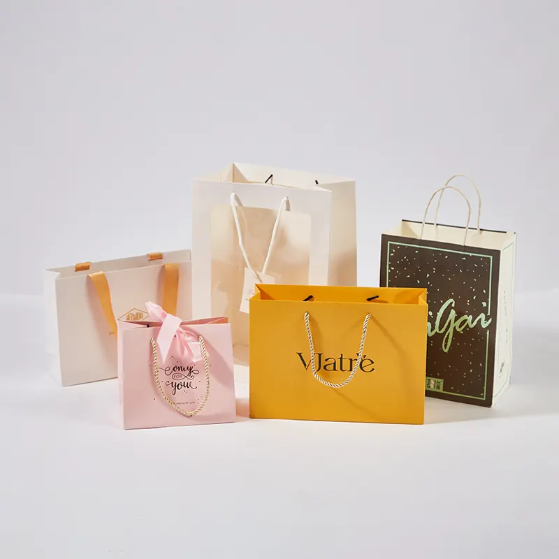 Bolsa de regalo de papel al por mayor tamaño personalizado Bestyle fabricantes bolsas de papel de regalo Kraft para ir de compras