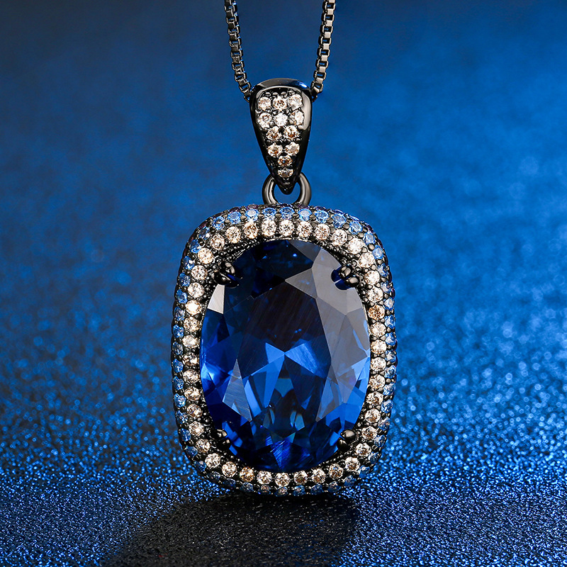 Black gold Blue pointed crystal pendant with chain