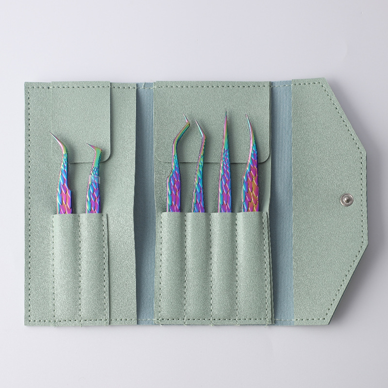 Conjunto de 6 piezas: ángel color titanio con bolso de cuero verde.
