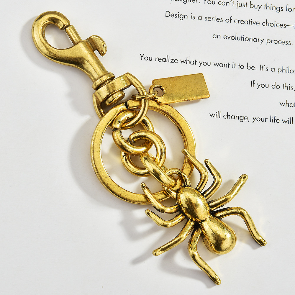 Pendentif sac araignée, doré