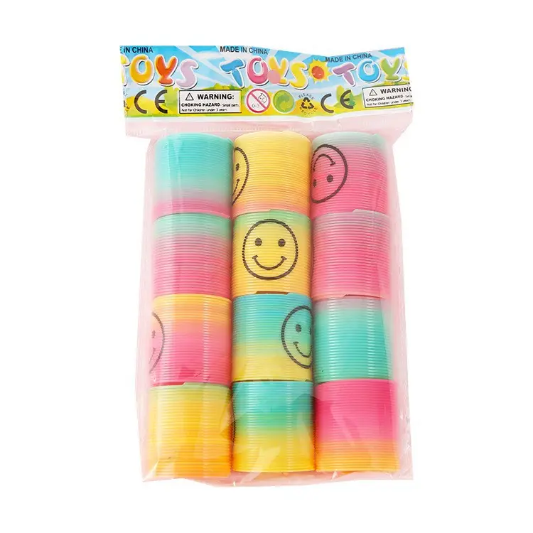 12 piezas Rainbow Smile Magic Springs Circle Juguetes para niños Fiesta de cumpleaños Favores Regalos de regalo