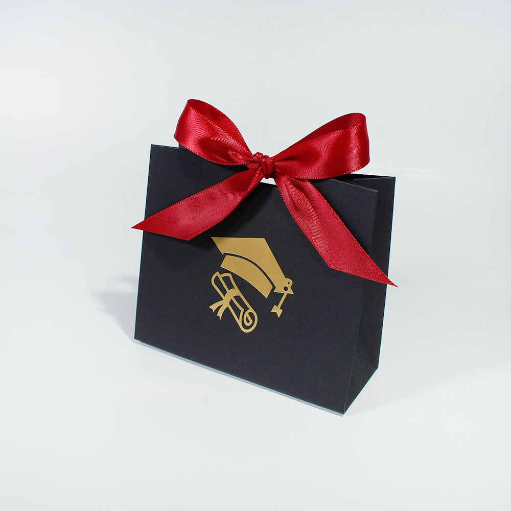 Black bag with red ribbon