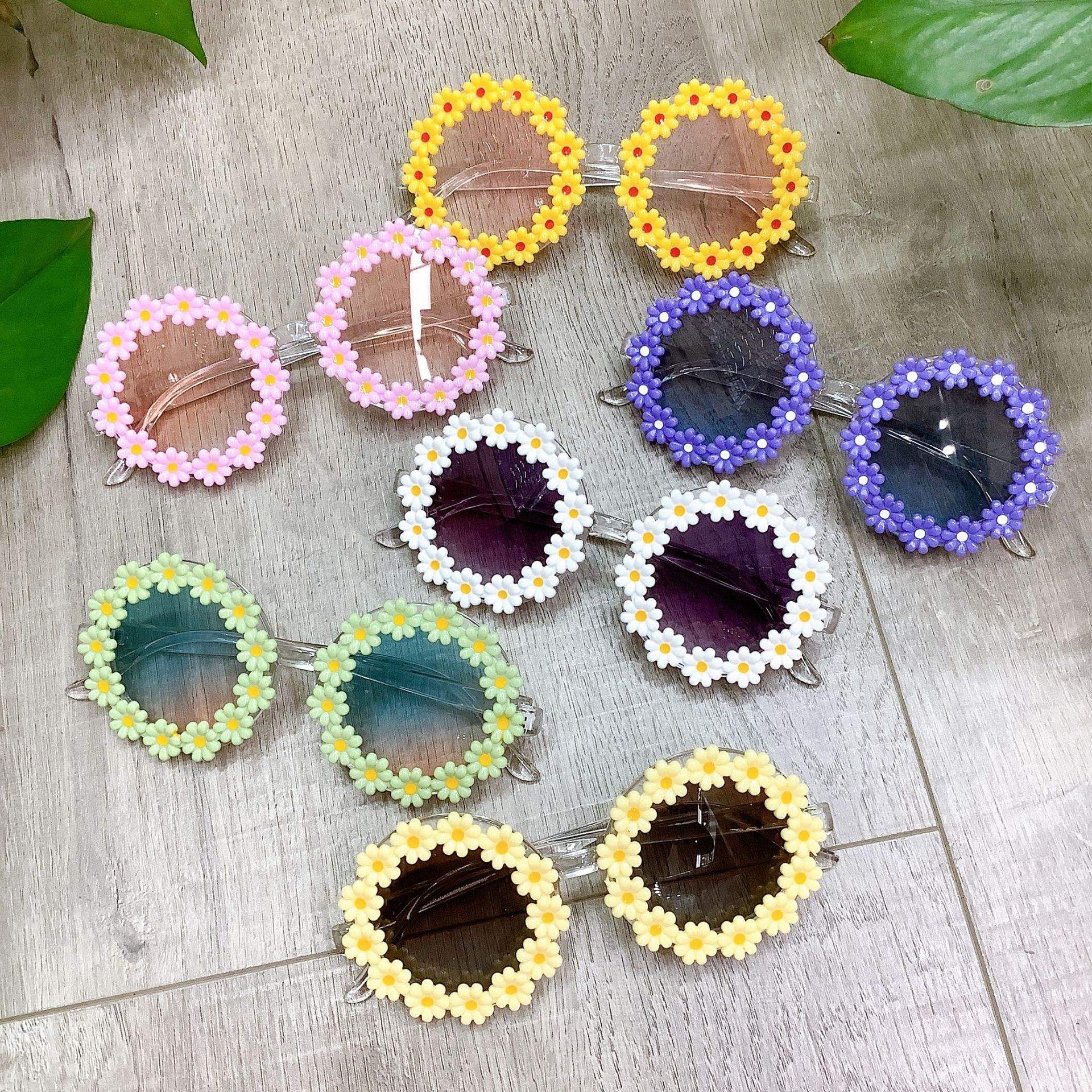 Occhiali da sole per bambini con fiore clicca sotto link