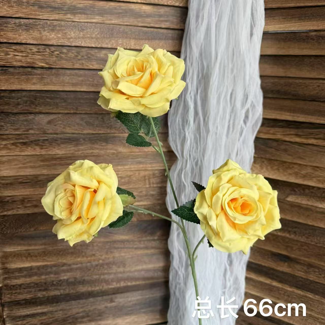 Yellow three-headed diamond rose