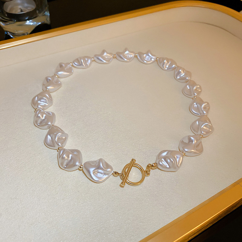 12irregular pearl T-shape clasp necklace