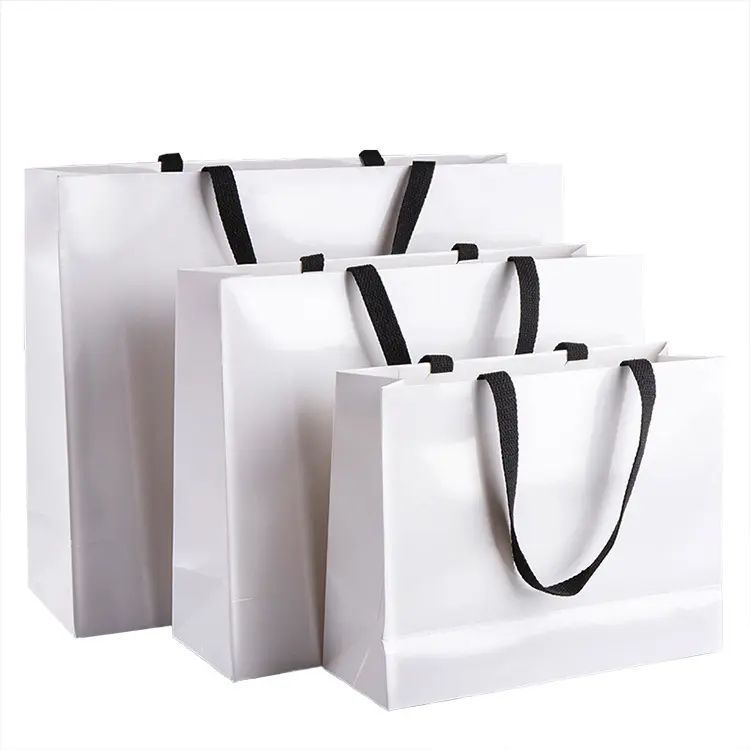 Bolsa de papel personalizada de lujo, 230 gsm, embalaje grande, bolsa de compras blanca con estampado de lámina de oro rosa, Logo de impresión, 250