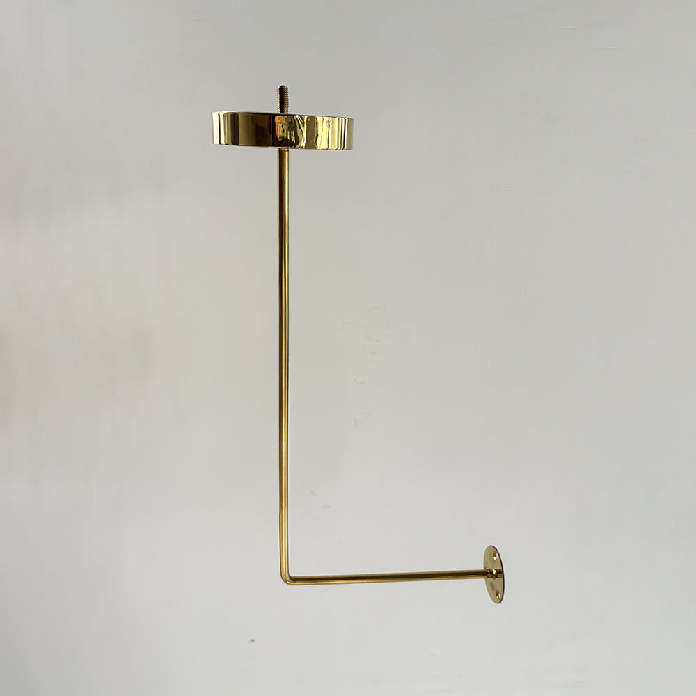 Support doré pour miroir