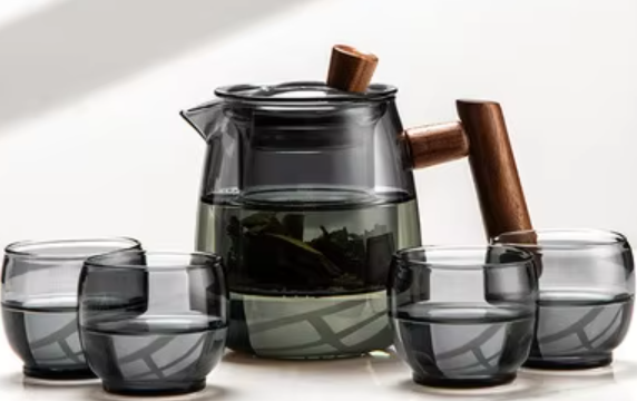 Teiera in vetro grigio con 4 tazze