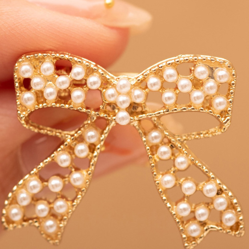 XP003 Golden Hollowed-out Small Faux Pearl Bowknot